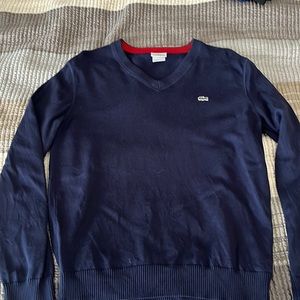 Lacoste v neck sweater . Navy. Size medium / 5